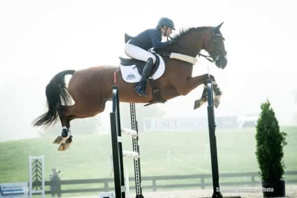 Liz Halliday Sharp and Deniro Z on their way to a clear showjumping round at Great Meadow International. PC: Shannon Brinkman